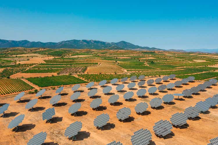 Solar panels sitting amongst the vineyards of Spain