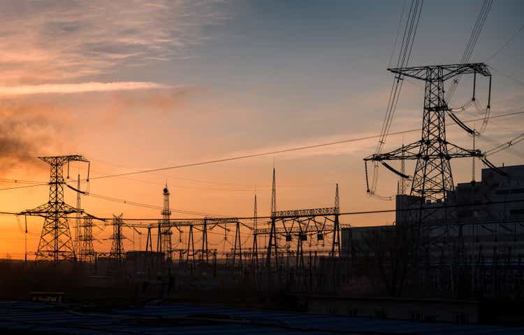 Power station at dusk and power lines