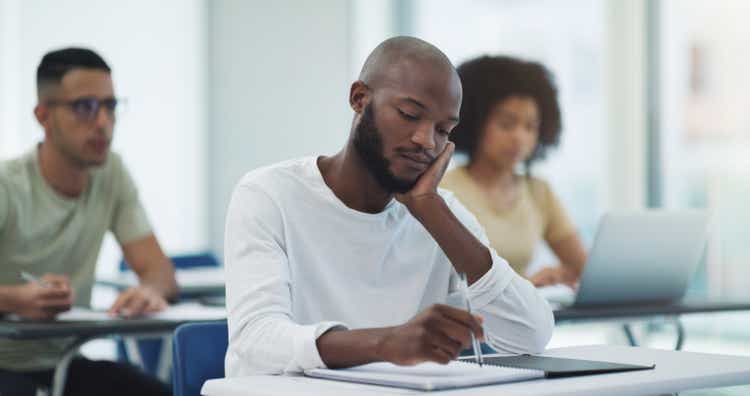 Shot of a class of students in a classroom at university