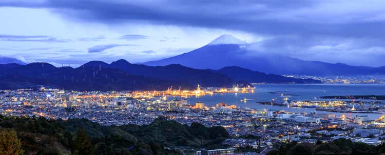 panorama twilight cityscape and shipping port and fuji mountain with blue sky background japan