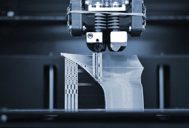Working 3D printer closeup.  Print 3D printer object.  Plastic Wire Filament.