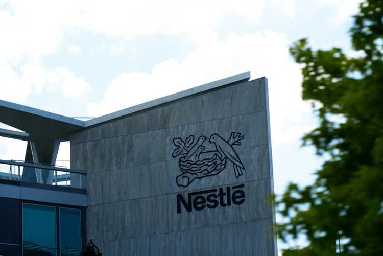 Emblem of food company Nestlé at headquarters.