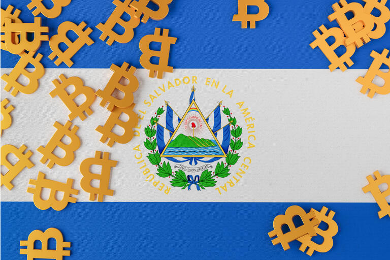 El Salvador flag with Bitcoin icons above
