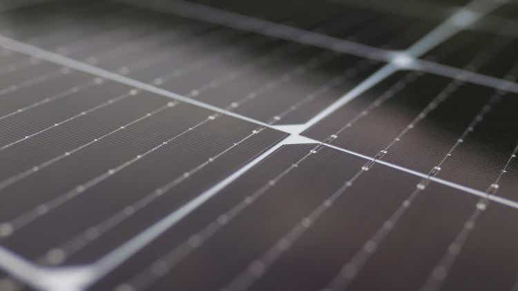 Close-up of modern photovoltaic solar battery panels. Solar panel, photovoltaic, alternative electricity source. Efficient ecological solar farm. Photovoltaic solar panel extreme close up