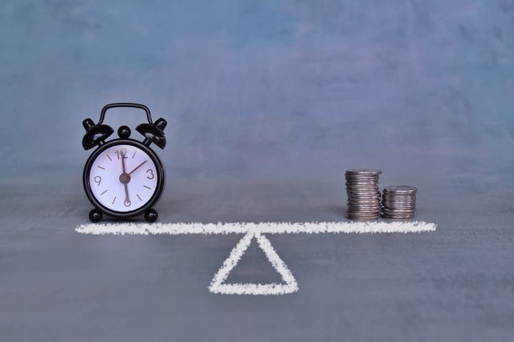 Balance between time and money concept