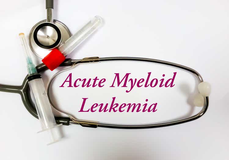 Acute Myeloid Leukemia word, medical term word with medical concepts in whiteboard and medical equipment.