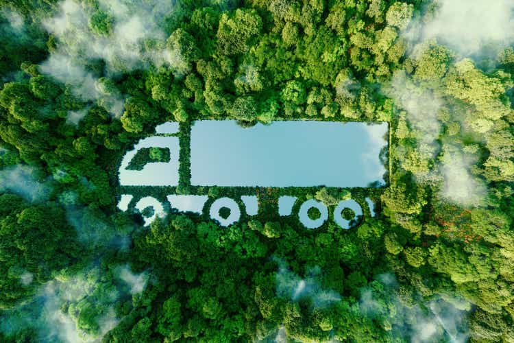 A truck-shaped lake in the midst of pristine nature, illustrating the concept of clean, greenhouse-free transport in the form of electric, hybrid or hydrogen propulsion. 3d rendering.