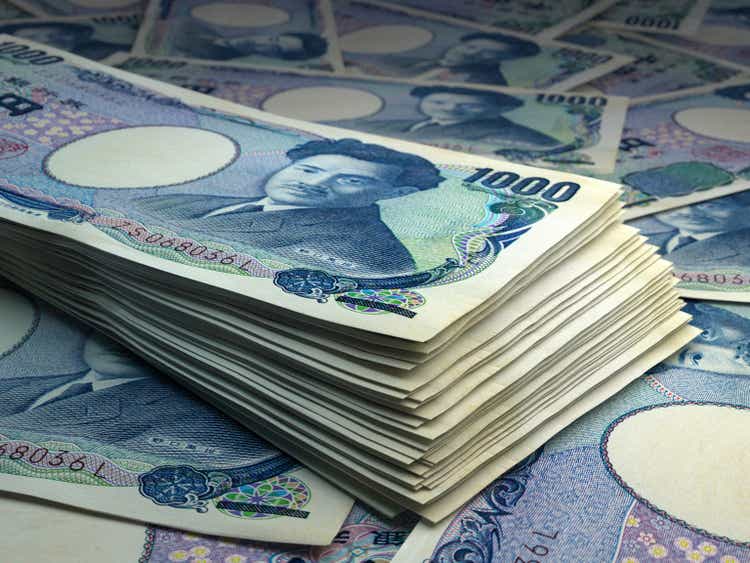 Japanese banknotes. Japaneseyen bills. 1000 JPY yuan. Business, finance background.