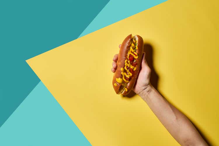 Hotdog on a colorful background.