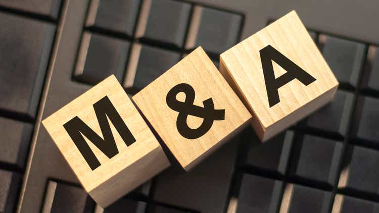 word m and a made with wood building blocks, stock image