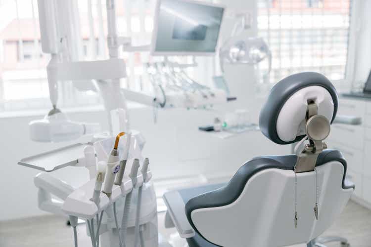 Modern dental drills and empty chair in the dentist"s office