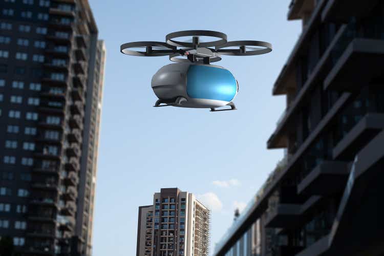 transportation drone flying above the city