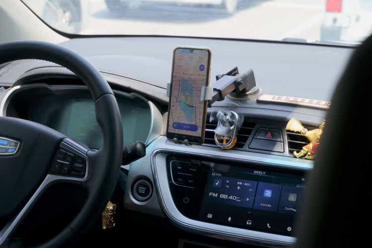 Mobile Phone DiDi App Asian Driver