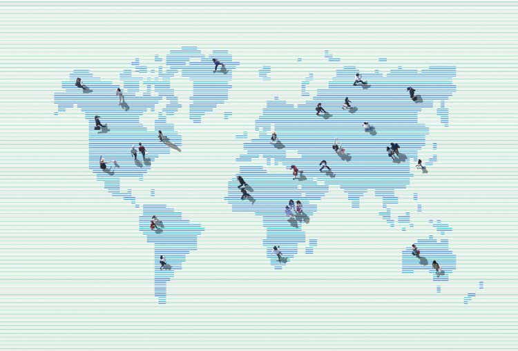 Image of people walking on a world map filled with high-speed data