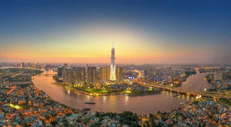 aerial view of Ho Chi Minh city, Vietnam, beauty skyscrapers along river light smooth down urban development