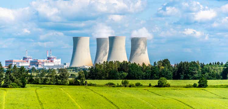 Nuclear power plant on the background of beautiful green summer meadow. Temelin, Czech Republic