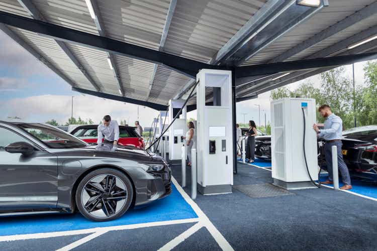 UK, York, People charging their electric cars at charging station