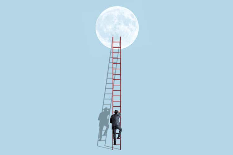 Man Uses A Tall Ladder To Climb To The Moon