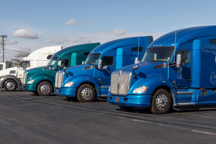 Kenworth Semi Tractor Trailer Trucks lined up for sale. Kenworth is owned by Paccar.