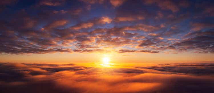 Beautiful dream-like photo of flying above the clouds