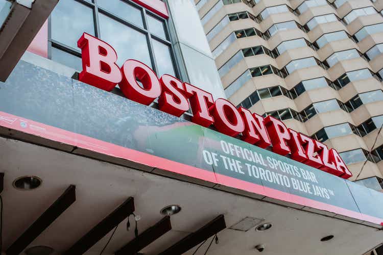 Boston Pizza in Toronto downtown. Boston Pizza is a family restaurant and sports bar serving great food, including pizza, TORONTO, CANADA - August 29, 2019