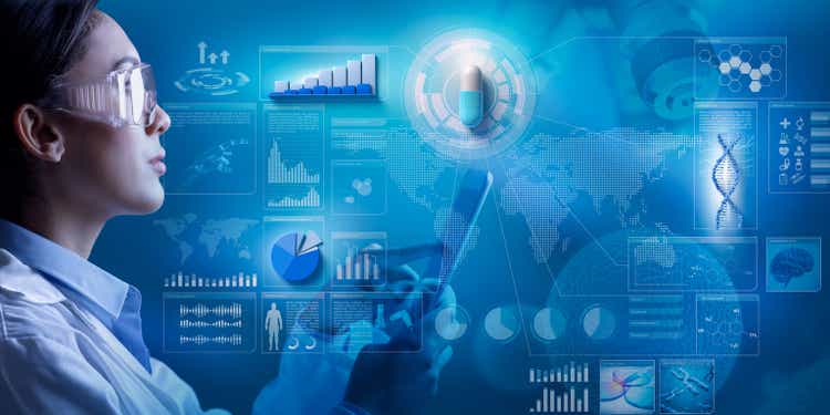 Female scientist and data on pharmaceutics research.