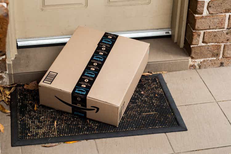 Amazon prime box delivered to a front door of residential building