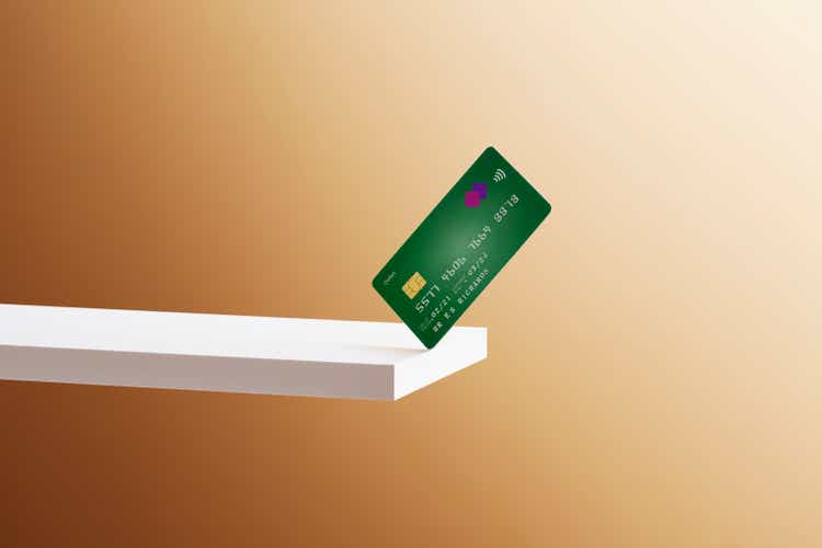 Debit card on the edge of the shelf