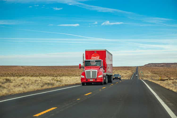 Coca-Cola truck driving on an U.S country road