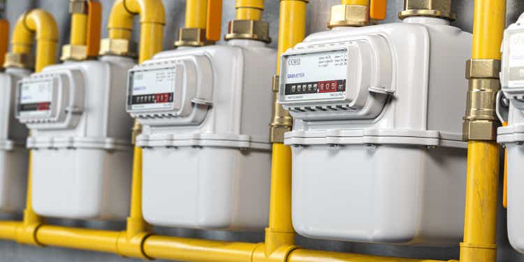 Natural gas meters iin a row. Household energy consumption.