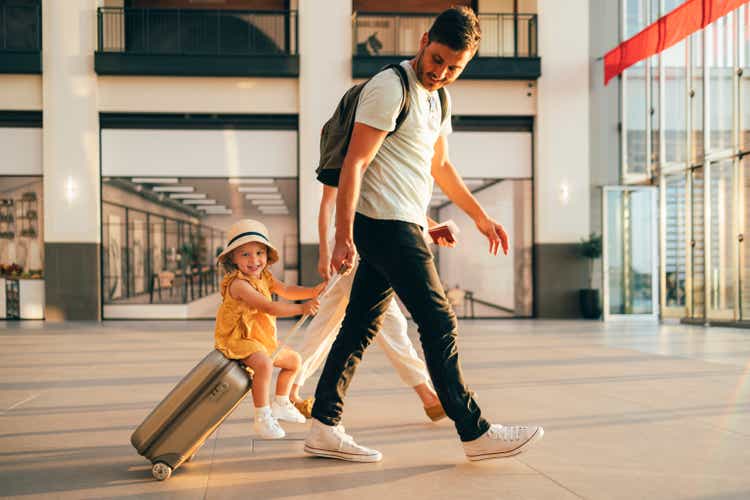 A young family enjoys traveling together.