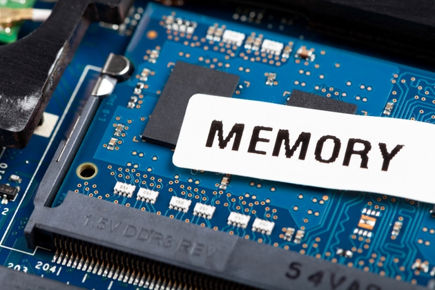 Laptop computer RAM memory stick module installed, object detail, macro, extreme closeup, nobody. Disassembled netbook, ram replacement and service up close, computer memory simple concept, technology