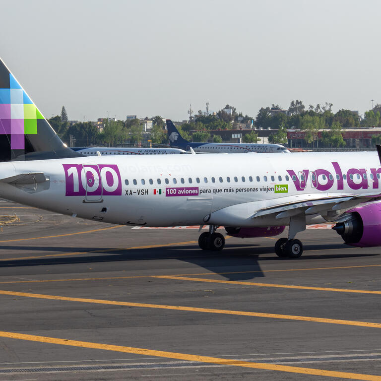 Volaris A320NEO XA-VSH (100th aircraft livery) at Mexico City Intl. Airport