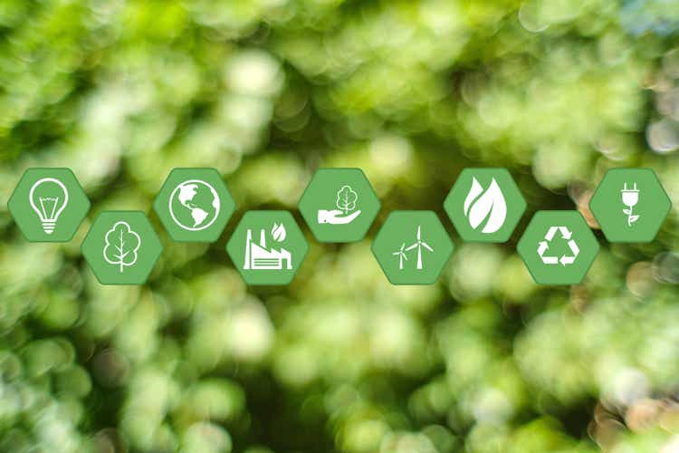 The concept of caring for the environment using ecological production and energy with icons on a green background.