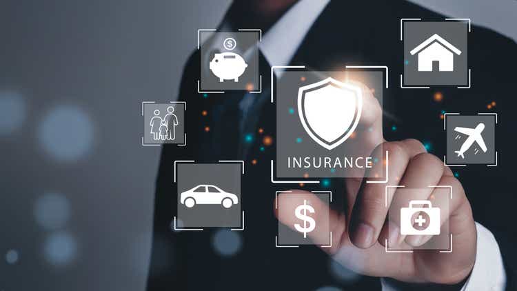 Businessman hand clicks insurance icons to car, travel, family and life, financial and health insurance. Insurance online buy concept.