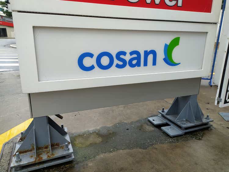 Sign with Cosan logo in a service station