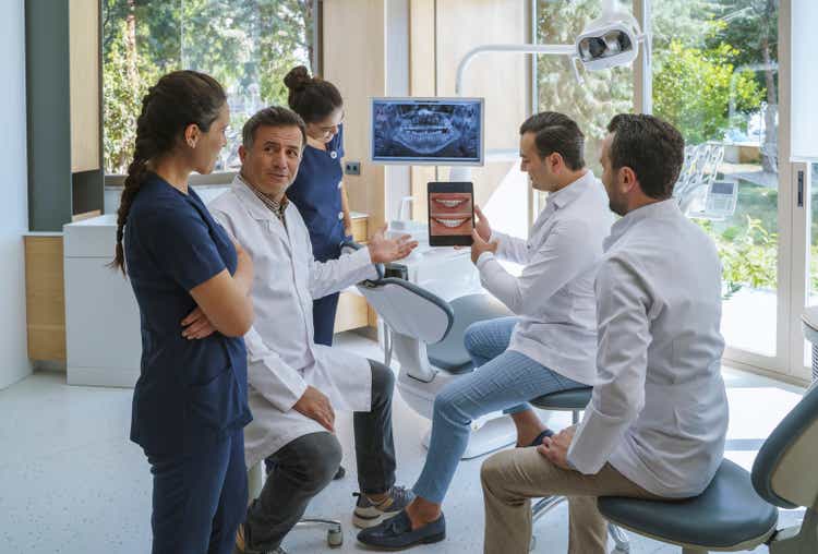 Medical dentist team working in the dental clinic