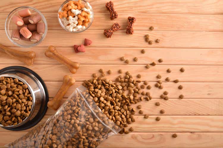 Various types of dry food for dog on table top