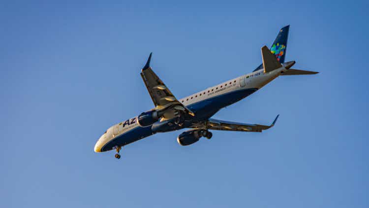 Brazilian commercial airliner from Azul Linhas Aéreas flying during the day