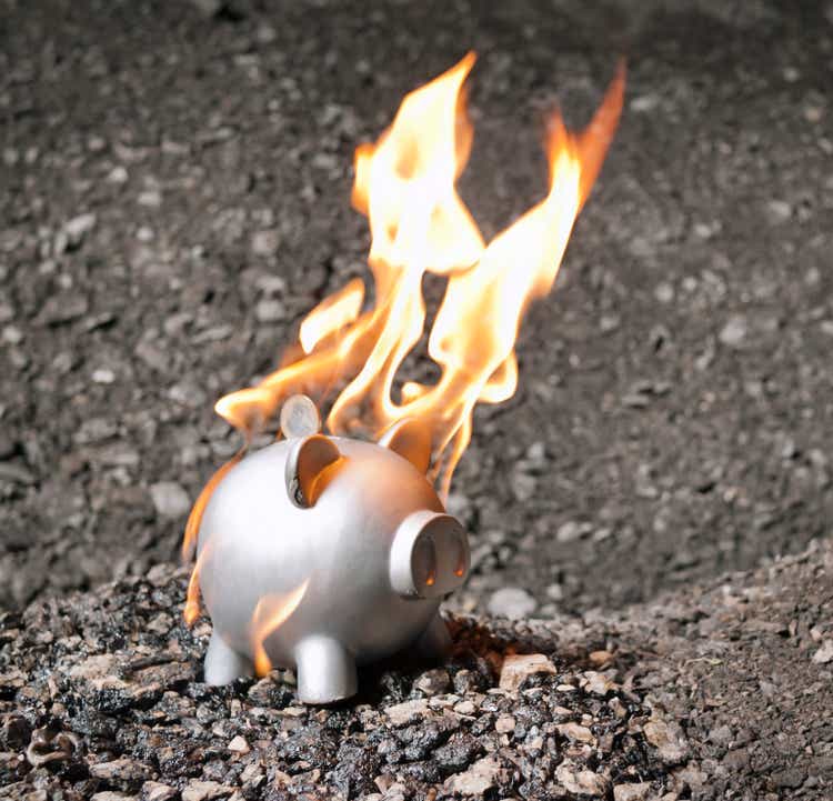 Piggy bank on fire