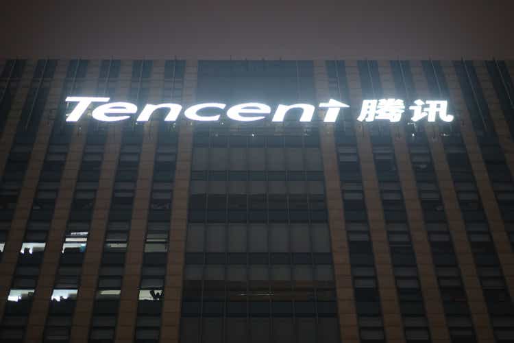 facade of Tencent company office building at night.