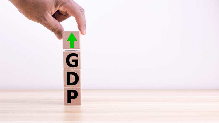 Concept of economic growth with higher GDP in cubic timber. Savings and Investments for Business Ideas digital economy and economic exchange.