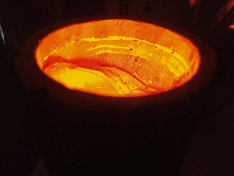 Crucible with glowing molten metal