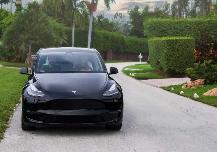 Tesla Model Y parked on the street.