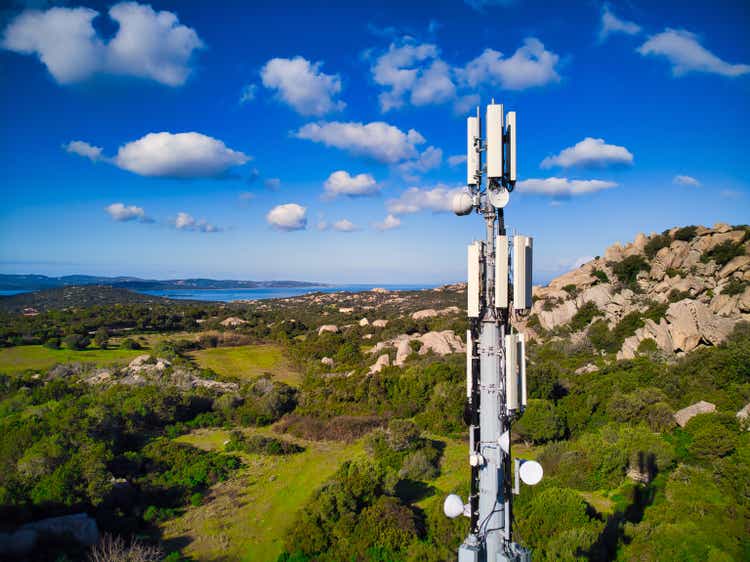 Cell phone communication antenna tower with rural landscape