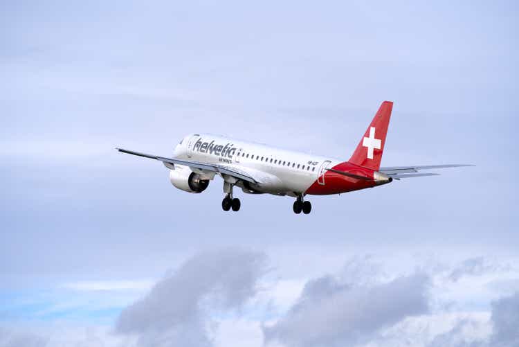 Swiss airport Zurich Kloten with cloudy sky background.