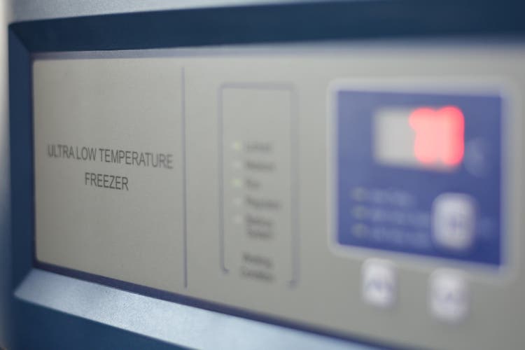 Selective focus of ultra low temperature -70 degree celsius freezer for keeping specimens for laboratory testing in hospital.Front of refrigerator storage blood from patient for research in university