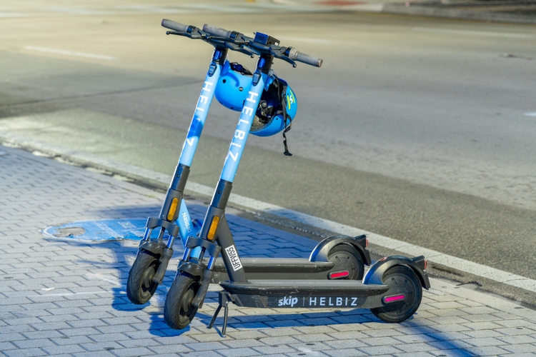 Night photo of a Helbiz rental scooter at Downtown Miami