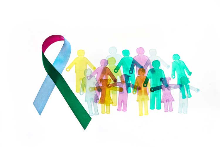 Rare Disease Day Background. Colorful awareness ribbon with group of people with rare diseases.