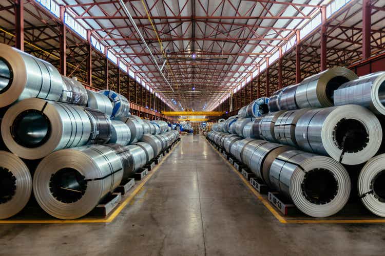 Rolls of galvanized steel sheet inside the factory or warehouse